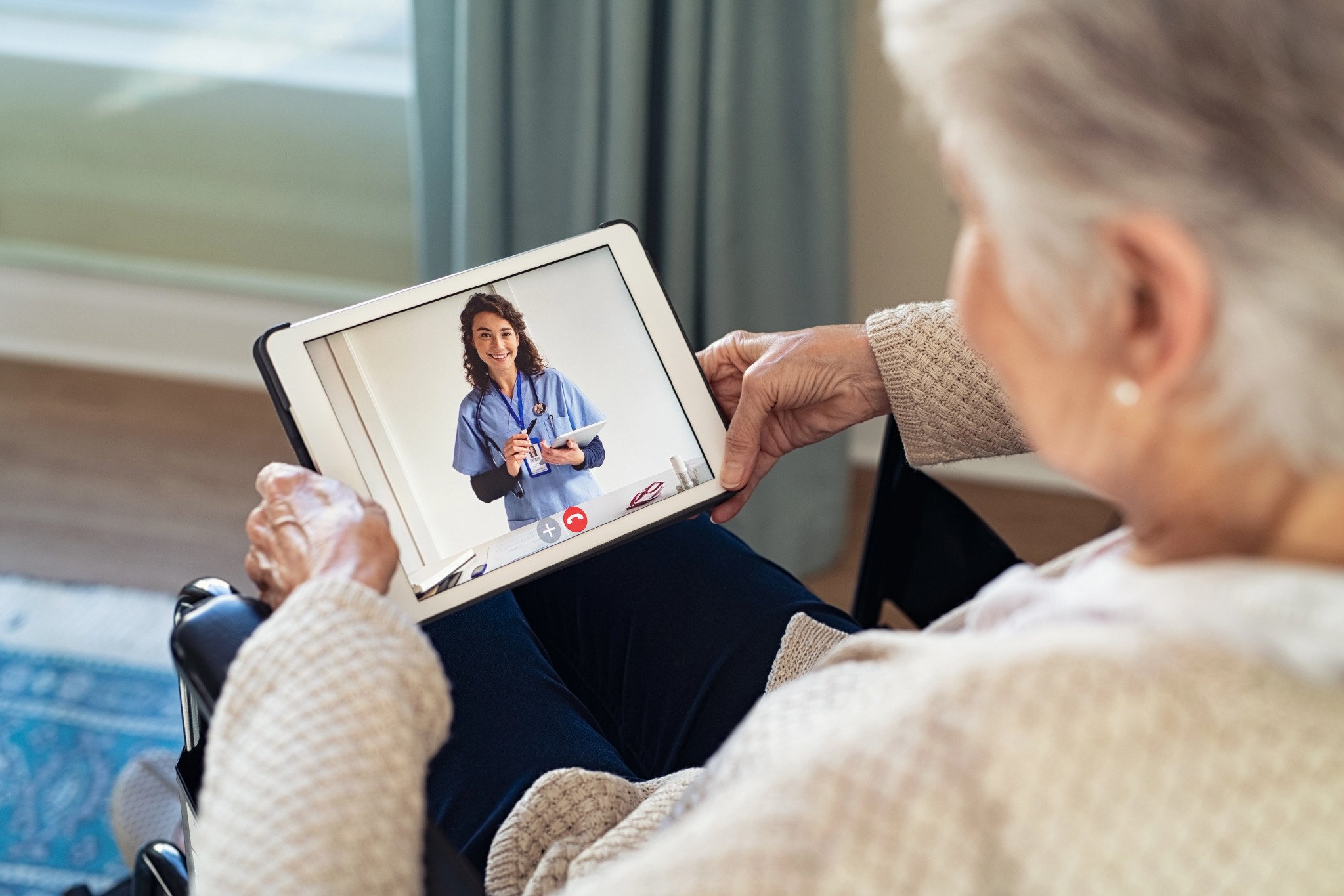old woman watching a video