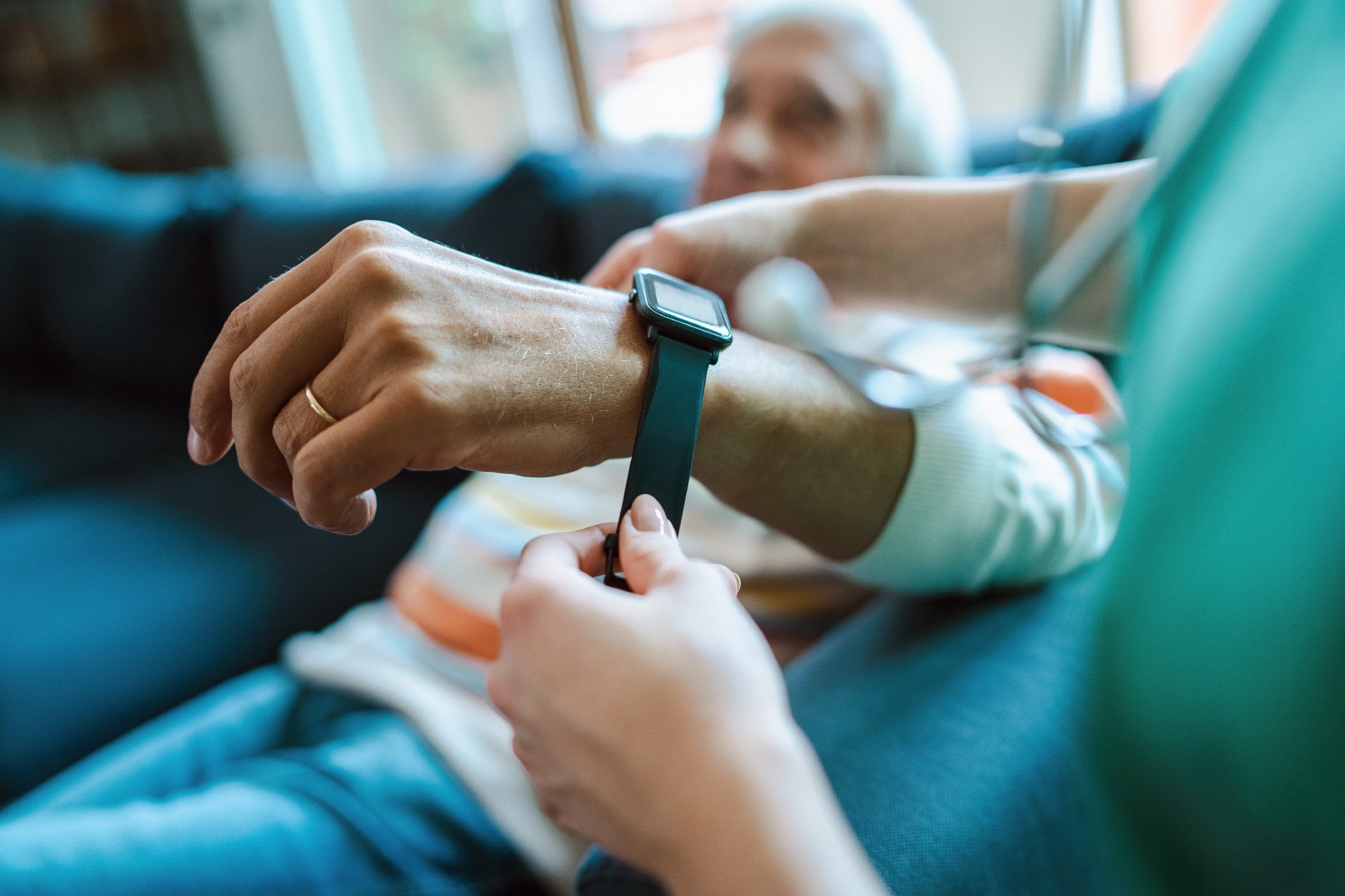 removing watch from an old mans wrist