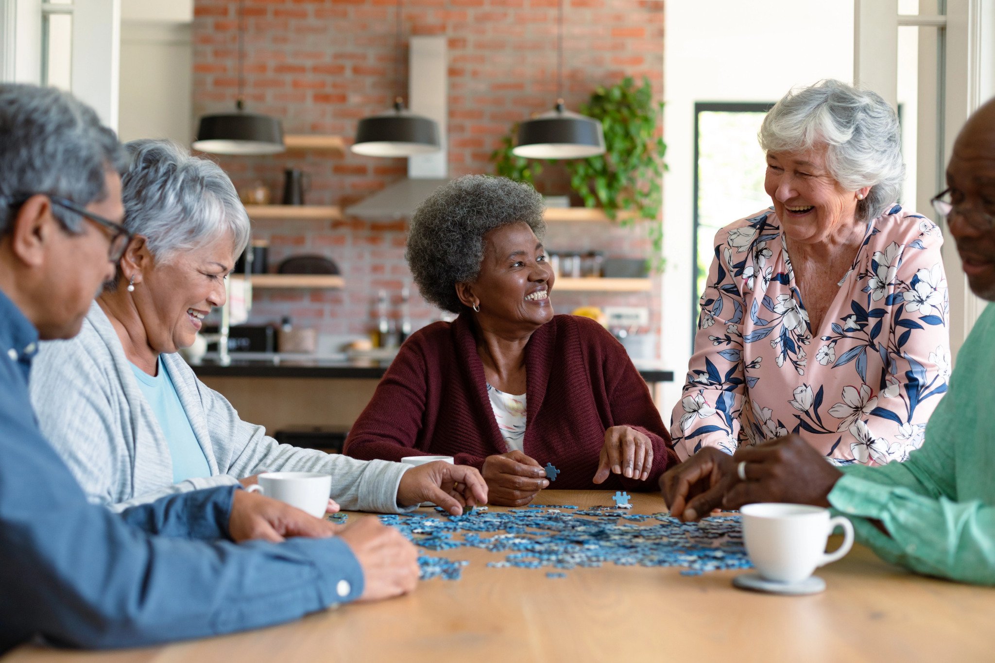 seniors solving a puzzle